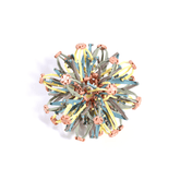 Mindfulness Magic Ball collapsed closed, a folding sphere of pastel blue, yellow and grey struts