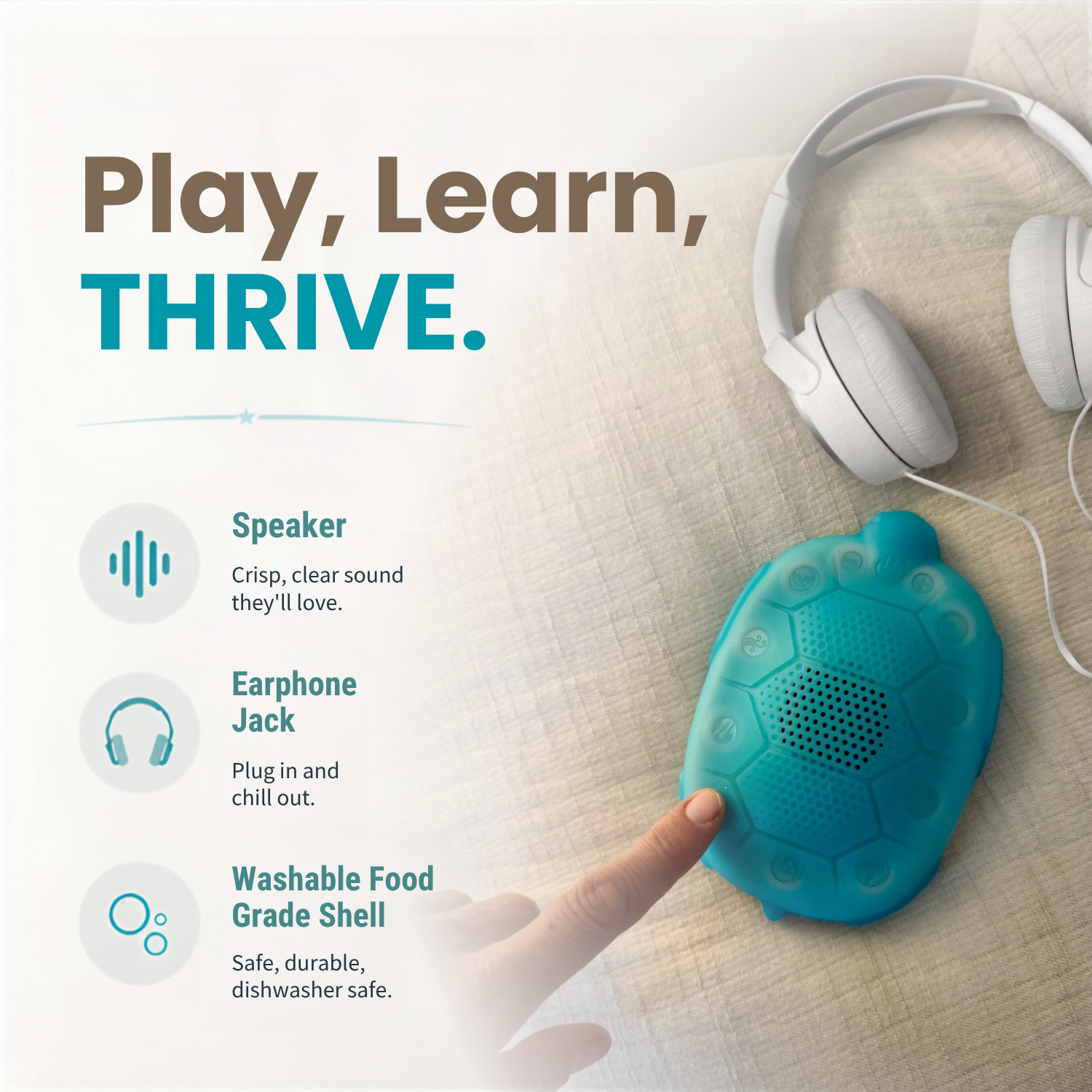A teal turtle-shaped Zenimal audio sleep and calm device is shown on a light fabric surface, with a finger touching it. White over-ear headphones sit nearby, and marketing text on the left reads 'Play, Learn, THRIVE.