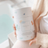 Child holding the Magnesium Calming Soak tub on their lap