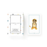 Yoga Snap Game box beside a Lion pose card