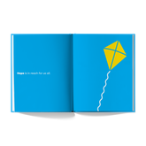 Closing book spread reading hope is in reach for us all, with a yellow kite