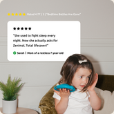 Child holding a teal Zenimal with a review overlay on a neutral background