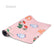 The Sweet yoga mat in pink, printed with strawberries, butterflies and a fox
