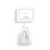 Patience Pebbles box and white drawstring storage bag