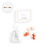 Patience Pebbles: printed box, white drawstring bag and a scatter of coral, pink and cream stacking stones, with an As Featured On The O List badge