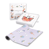 Yoga card box and card tray beside the lilac Enchanted mat printed with unicorns and rainbows
