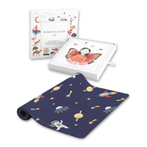 Yoga card box and card tray beside the navy Space mat printed with planets, rockets and astronauts