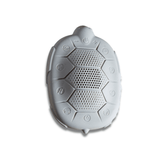 Light gray replacement turtle shell for Zenimal Kids, top view, with speaker grille panels and embossed track icons around the edge