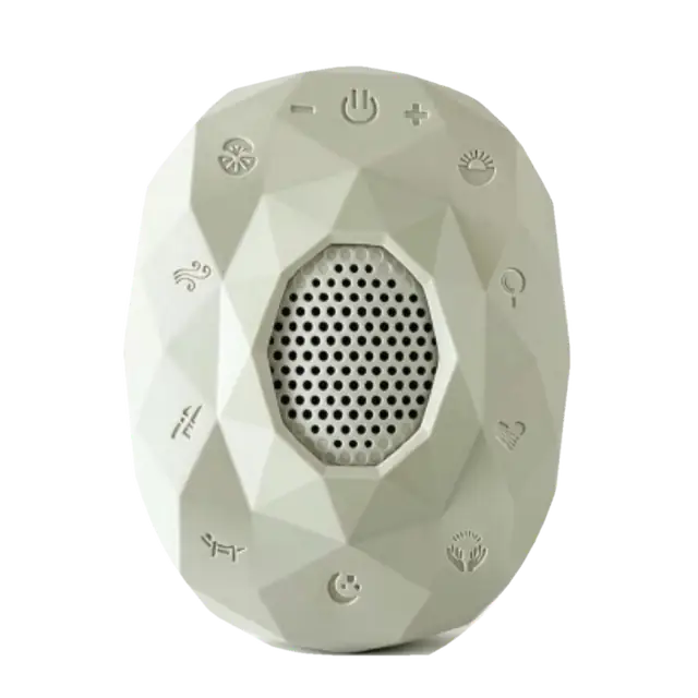 Zenimal+ seen from above, a faceted sage companion with eight buttons around a round speaker, a power button at the top and a sleep button at the bottom